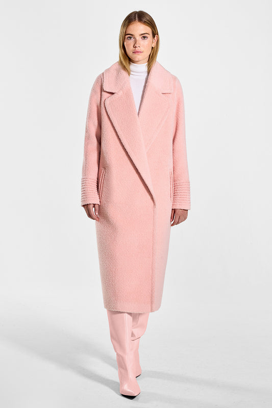 Sentaler Bouclé Alpaca Long Raglan Sleeve Notched Collar Coat featured in Bouclé Alpaca and available in Pink Clay. Seen from front on model.