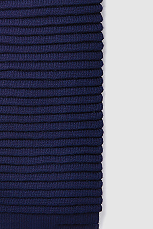 Sentaler Kids (6-14 Years) Ribbed Scarf featured in Baby Alpaca and available in Navy. Seen close up.