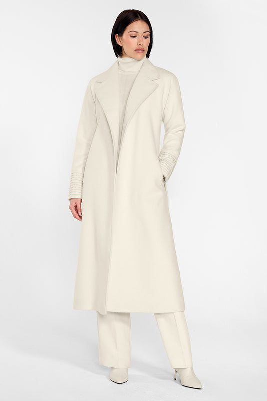 Sentaler Long Notched Collar Raglan Sleeve Wrap Coat featured in Baby Alpaca and available in Ivory. Seen from front on female model who is wearing the coat open.