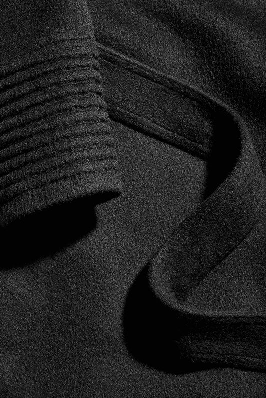 Sentaler Long Wide Collar Wrap Coat featured in Baby Alpaca and available in Black. Seen fabric close up as off figure.