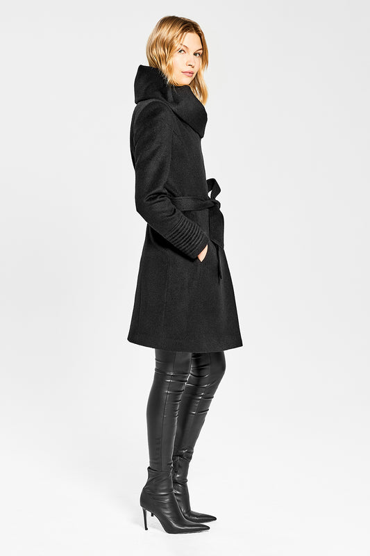 Sentaler Mid Length Hooded Wrap Coat featured in Baby Alpaca and available in Black. Seen from side on model.