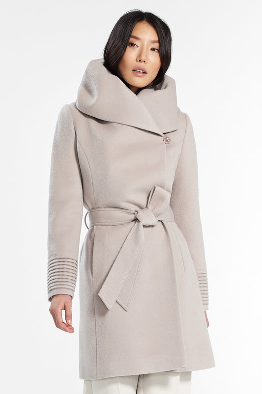 Sentaler Mid Length Hooded Wrap Coat featured in Baby Alpaca and available in Bleeker Beige. Seen from front above the knee.