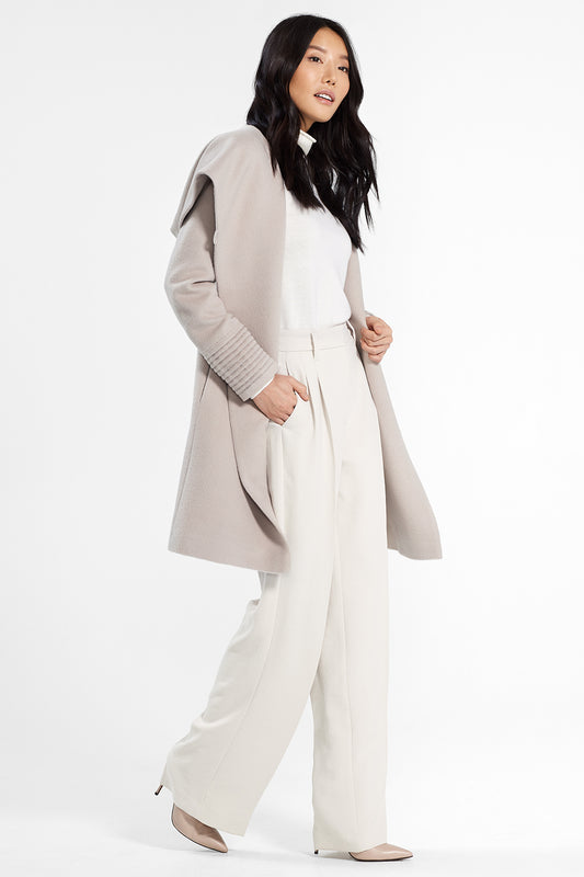 Sentaler Mid Length Hooded Wrap Coat featured in Baby Alpaca and available in Bleeker Beige. Seen from side.