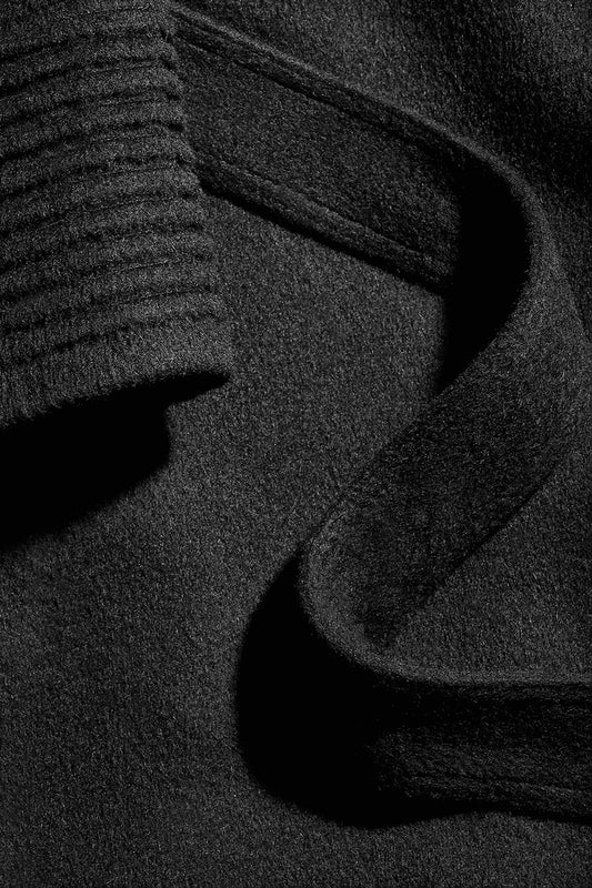 Sentaler Mid Length Shawl Collar Wrap Coat with Ribbed Sleeves featured in Baby Alpaca and available in Black. Seen as fabric close up.