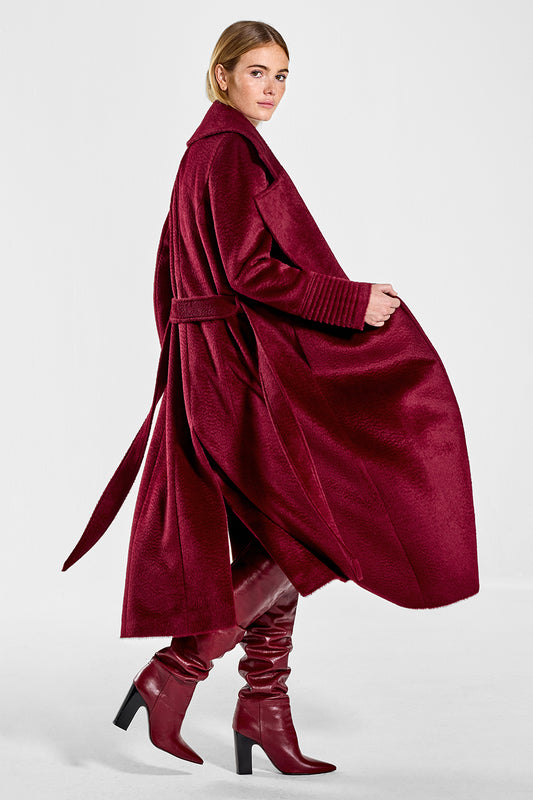 Sentaler Suri Alpaca Long Notched Collar Wrap Coat featured in Suri Alpaca and available in Bordeaux. Seen from side open on model.