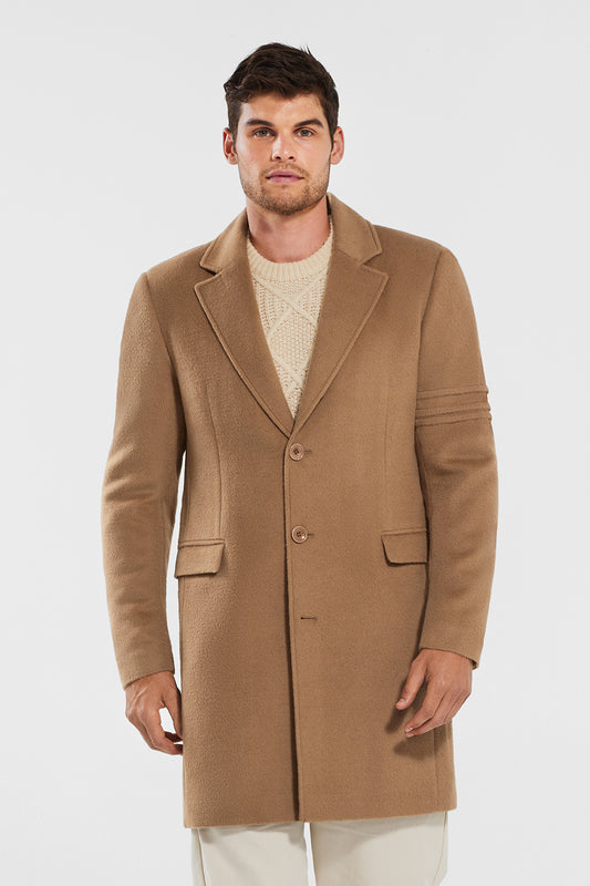Sentaler Technical Baby Alpaca Notched Lapel Overcoat featured in Technical Baby Alpaca and available in Dark Camel. Seen from front above the knees.