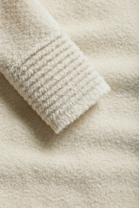 Sentaler Bouclé Alpaca Long Notched Collar Wrap Coat featured in Bouclé Alpaca and available in Ivory. Seen fabric up close.