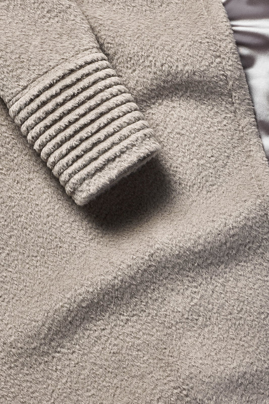 Sentaler Bouclé Alpaca Mid Length Oversized Notched Collar Coat featured in Bouclé Alpaca and available in Sand. Seen fabric close up.